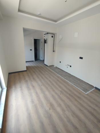 GÜVENAY - ÇORUM BAHÇELİEVLER C.TESİ PAZARI YANI 1+1 SIFIR SATILIK DAİRE 