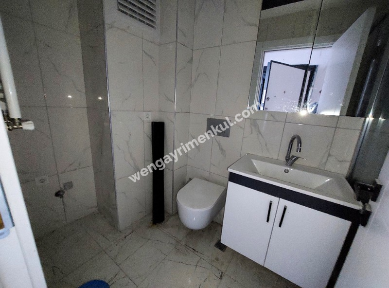 WEN BERKAN GÜLER'DEN KARLITEPE MAH'DA 1+1 65m2 1. KAT KAPALI OTAPARK SIFIR