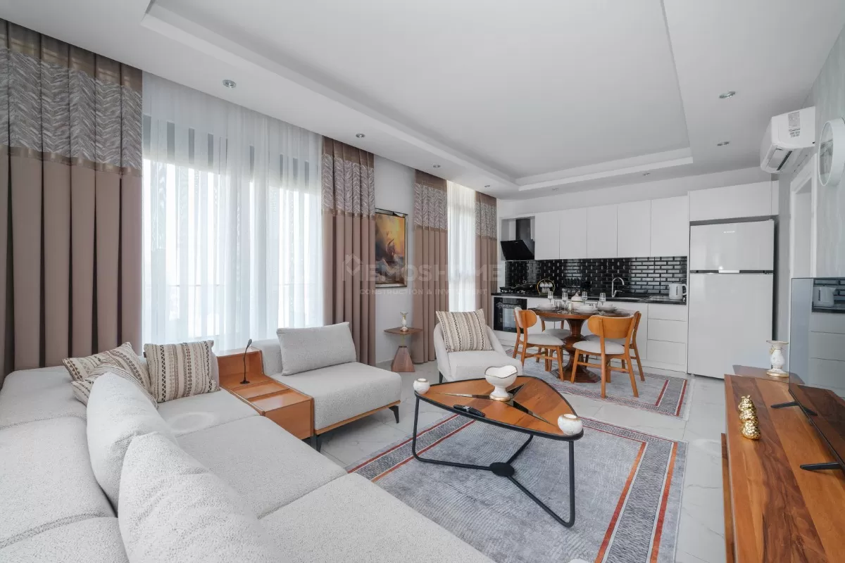 Элегантные апартаменты 2+1 с видом на море в Махмутларе