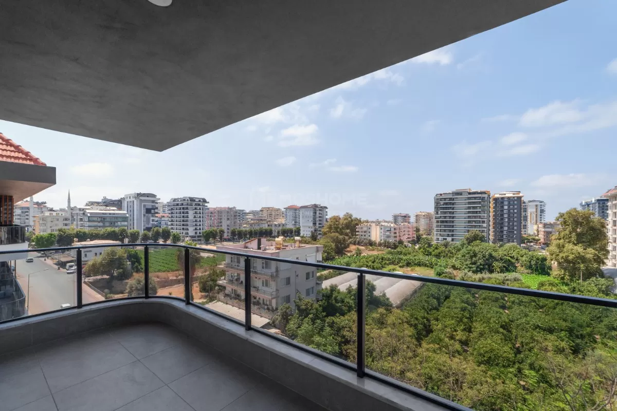 Элегантные апартаменты 2+1 с видом на море в Махмутларе