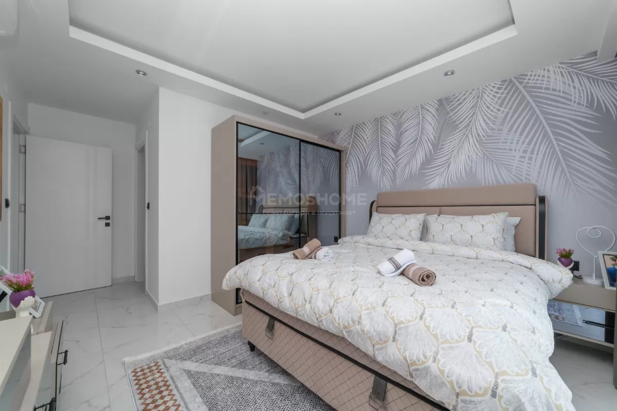 Элегантные апартаменты 2+1 с видом на море в Махмутларе