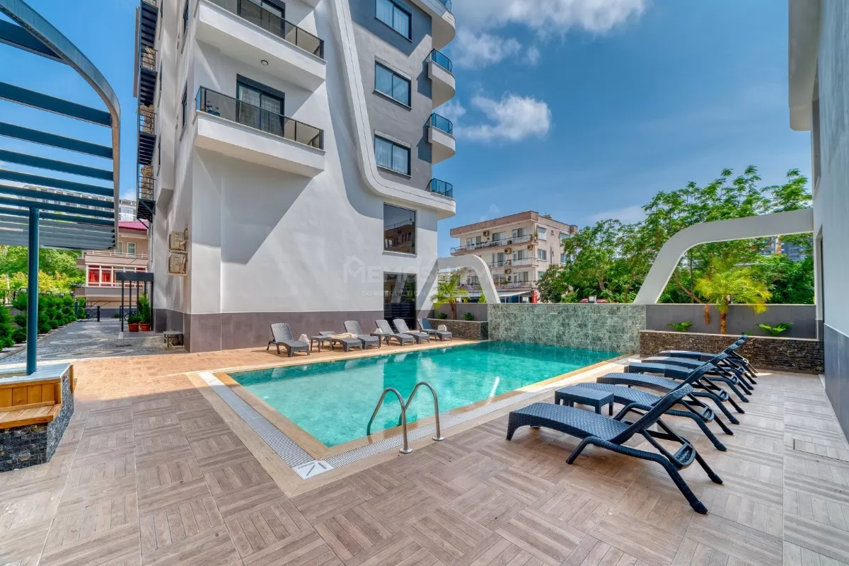 Элегантные апартаменты 2+1 с видом на море в Махмутларе