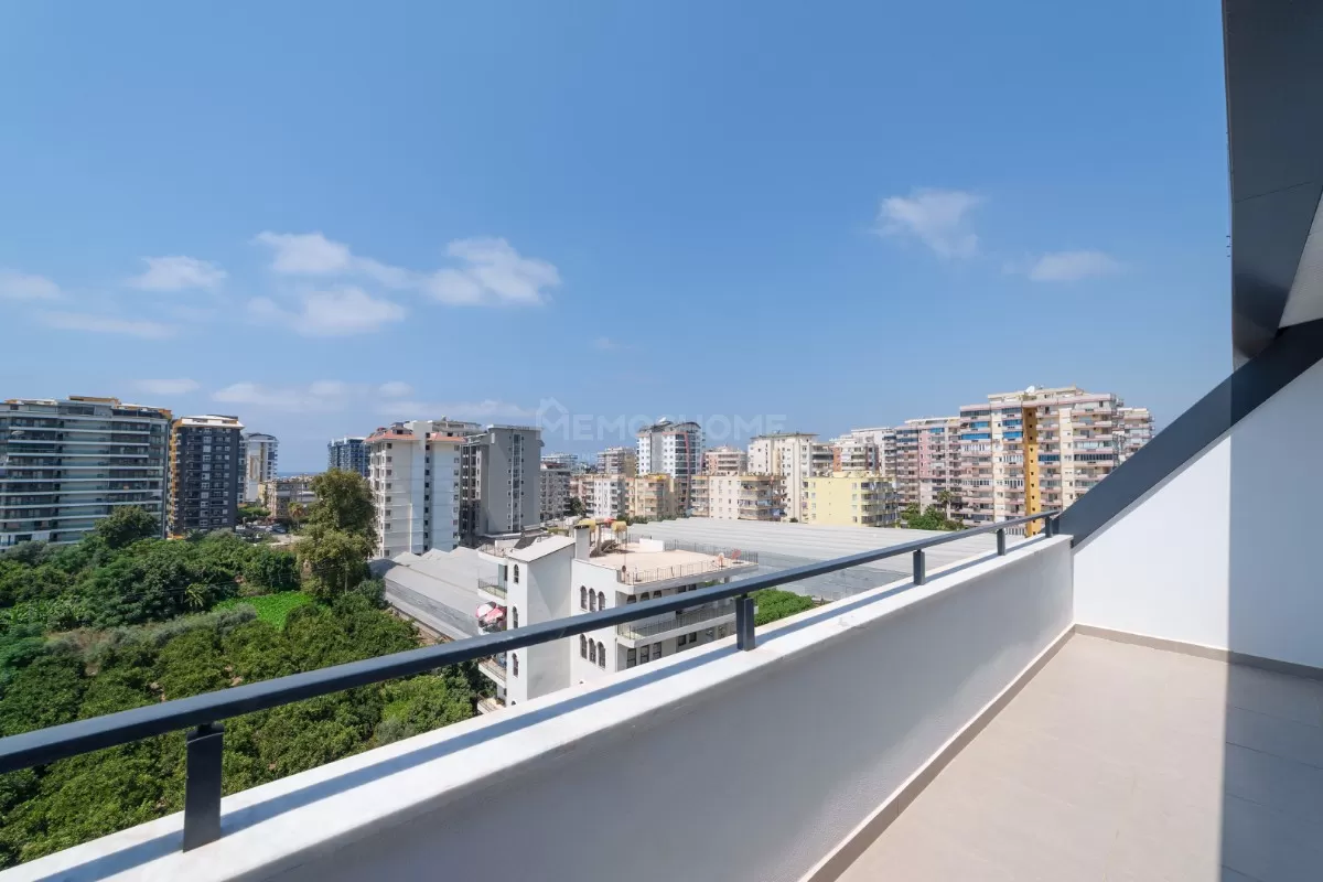 Элегантные апартаменты 2+1 с видом на море в Махмутларе