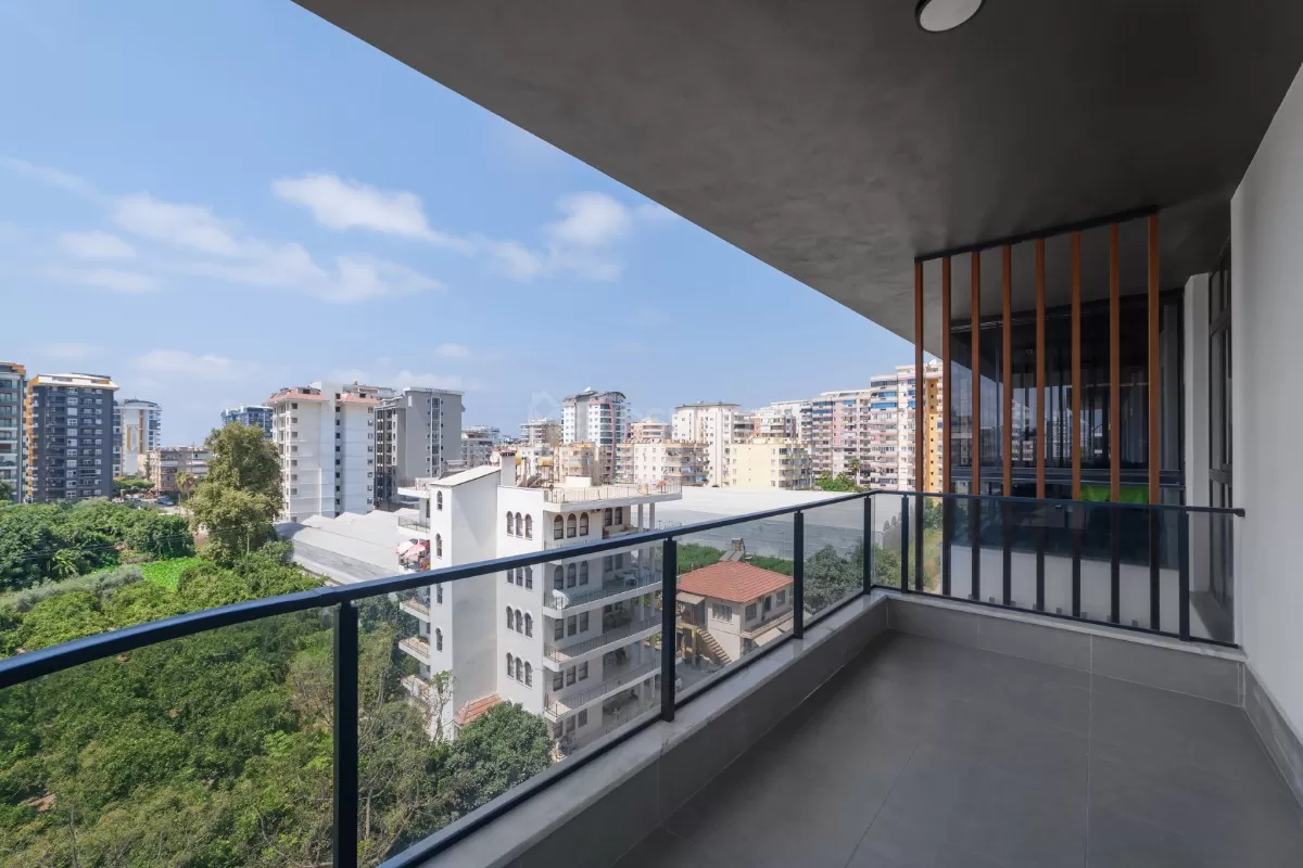 Элегантные апартаменты 2+1 с видом на море в Махмутларе