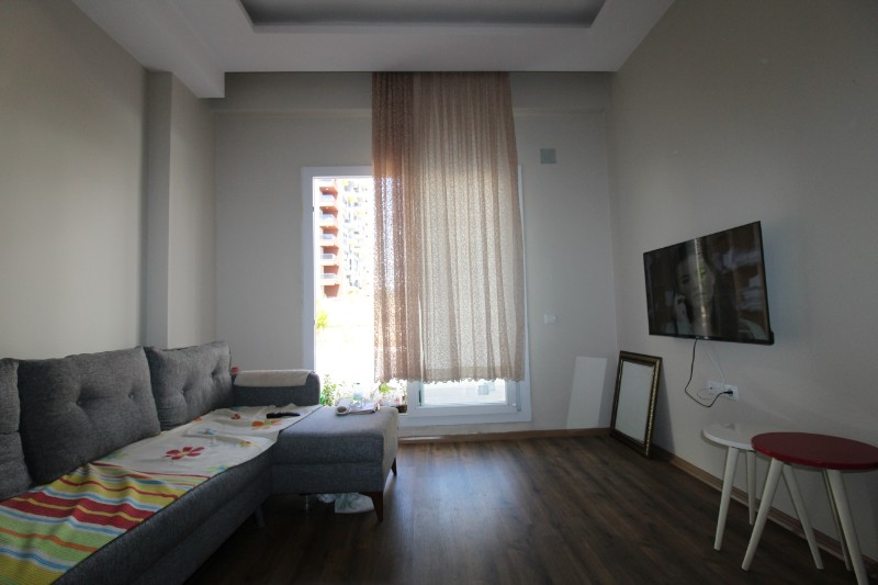 ASLAN'DAN TÖMÜK TE DENİZE 100 M MESAFEDE HAVUZLU 1+1