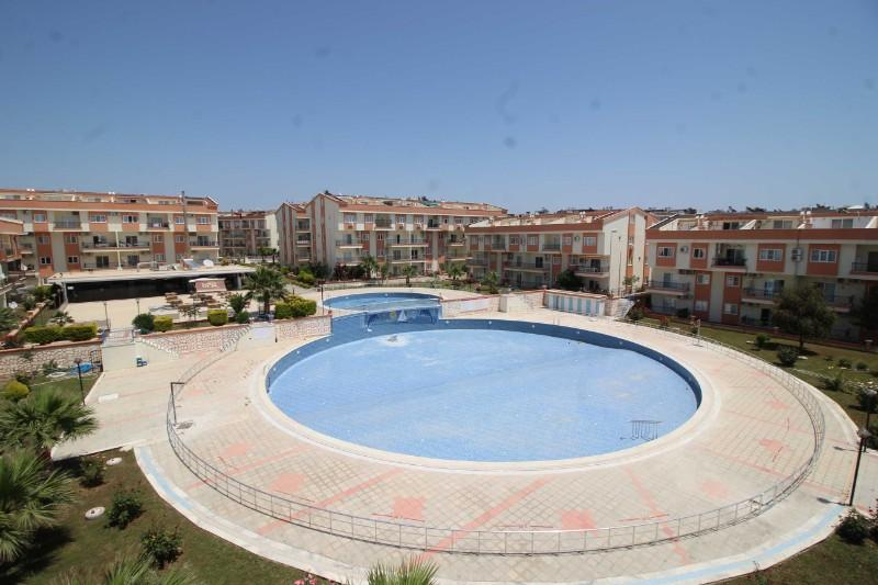 dıdımde yüzme havuzlu sıtede satılık 3+1 ara kat daire 