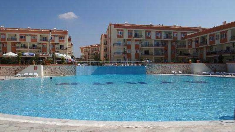 dıdımde yüzme havuzlu sıtede satılık 3+1 ara kat daire 