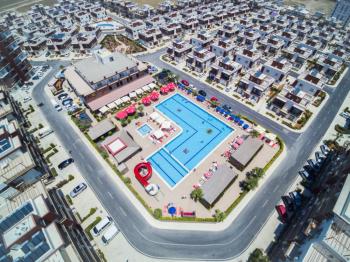İskele Long Beach’te Denize Yürüme Mesafesinde, Ful Eşyalı,  50 Ay Vade ile Stüdyo Taşınmaya Hazır Daireler Seni Bekliyor