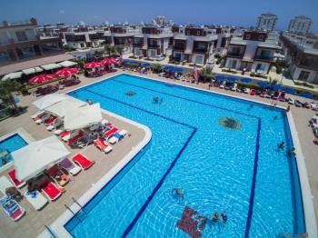 İskele Long Beach’te Denize Yürüme Mesafesinde, Ful Eşyalı,  50 Ay Vade ile Stüdyo Taşınmaya Hazır Daireler Seni Bekliyor