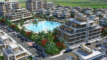 İskele Longbeach’te Denize Yürüme Mesafesinde, Ful Eşyalı, 50 Ay Vade ile  Taşınmaya Hazır 2+1 Daireler Seni Bekliyor
