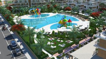 İskele Longbeach’te Denize Yürüme Mesafesinde, Ful Eşyalı, 50 Ay Vade ile  Taşınmaya Hazır 2+1 Daireler Seni Bekliyor