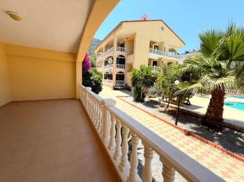 Akbük'ün Kalbinde Havuz Cepheli 2+1 Eşyalı Yazlık
