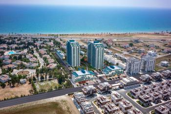 İskele Long Beach’te Denize Yürüme Mesafesinde, Ful Eşyalı,  50 Ay Vade ile Stüdyo Taşınmaya Hazır Daireler Seni Bekliyor