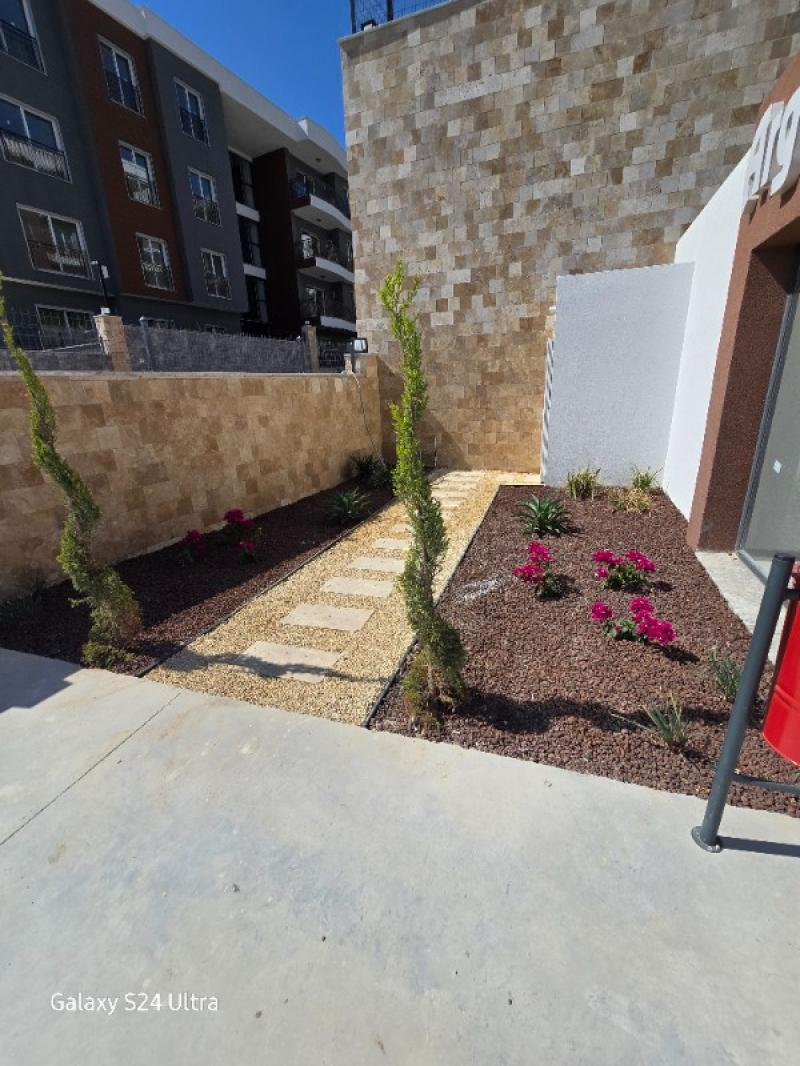 KUŞADASINDA HAVUZLU DENİZ MANZARALI KAPALI OTOPARKLI 2+1 SATILIK DAİRE