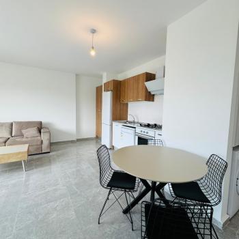 Kıbrıs Girne Alsancak Bölgesinde Satılık Eşyalı 1+1 Daire