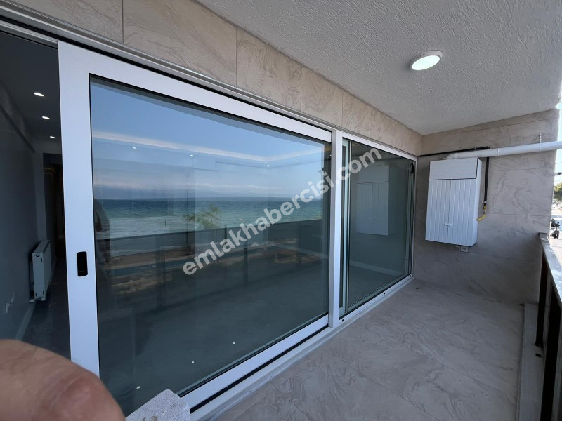 EMLAK HABERCİSİ 'NDEN MUDANYA GÜZELYALI SAHİLDE İDO 'YA 50 METRE PANORAMİK DENİZ MANZARALI SATILIK 2+1 DAİRE