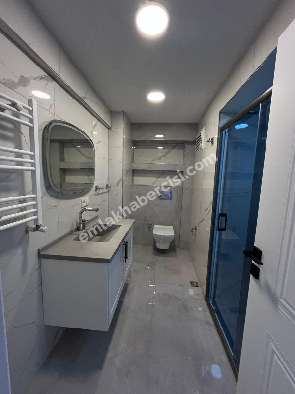 EMLAK HABERCİSİ 'NDEN MUDANYA GÜZELYALI SAHİLDE İDO 'YA 50 METRE PANORAMİK DENİZ MANZARALI SATILIK 2+1 DAİRE