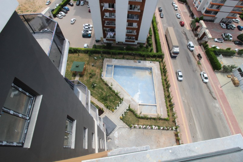 ASLAN'DAN SİTE İÇİ HAVUZLU GENİŞ PEYZAJLI 2+1 DAİRE