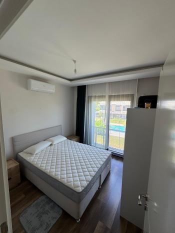 KUŞADASI DAVUTLARDA BOL YEŞİL VE DOGA MANZARALI SATILIK 3+1 VİLLA