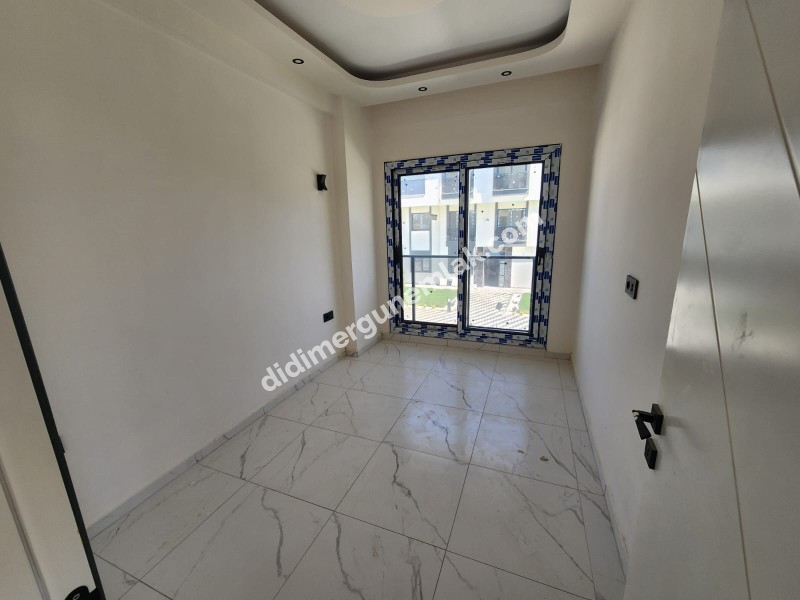 CUMHURİYET MAHALLESİ'NDE TATİL KÖYÜ KONFORUNDA SIFIR 2+1 SATILIK DAİRE