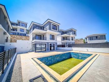 DİDİM AKBÜK MAHALLESİNDE FULL DENİZ MANZARALI,MÜSTAKİL HAVUZLU VE OTOPARKLI 4+1 SATILIK VİLLA