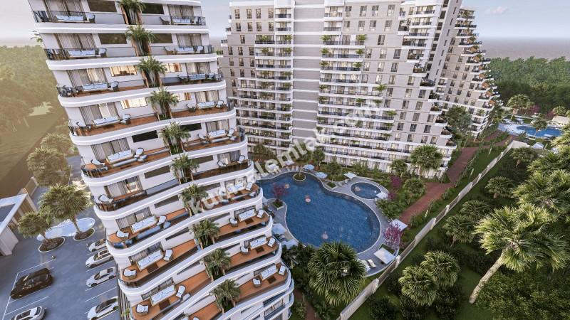 MAĞUSA GEÇİTKALE BÖLGESİNDE LÜKS SİTE İÇERSİNDE SATILIK 1 + 1 DAİRELER