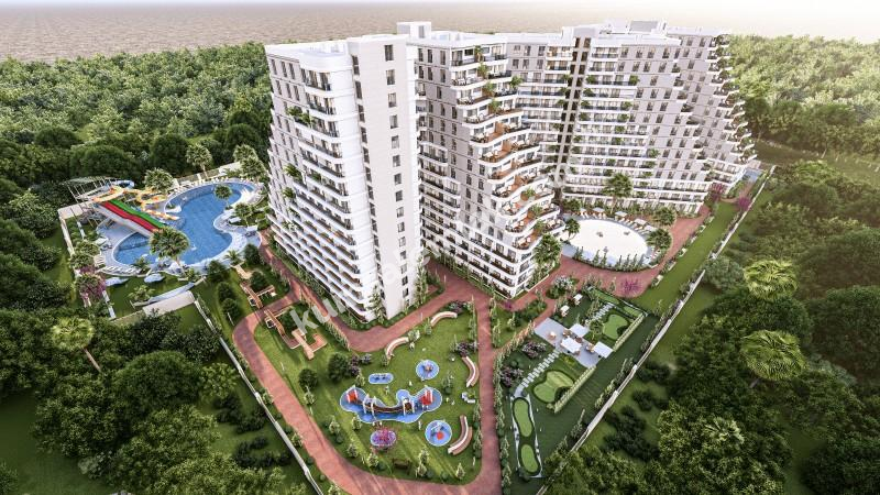 MAĞUSA GEÇİTKALE BÖLGESİNDE LÜKS SİTE İÇERSİNDE SATILIK 1 + 1 DAİRELER