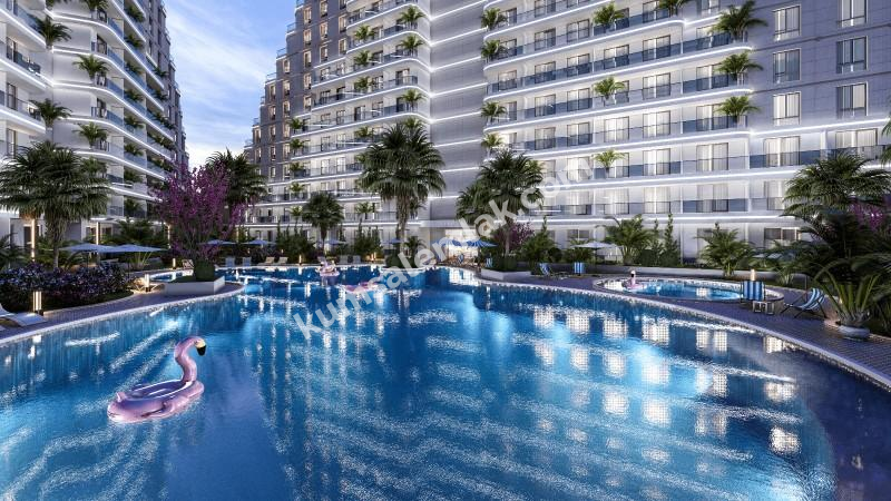 MAĞUSA GEÇİTKALE BÖLGESİNDE LÜKS SİTE İÇERSİNDE SATILIK 1 + 1 DAİRELER