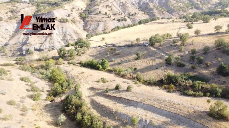 YILMAZ EMLAK'TAN TAŞLICA (ŞAMÜK) KÖYÜNDE SATILIK 54.378 m² KELEPİR TARLA