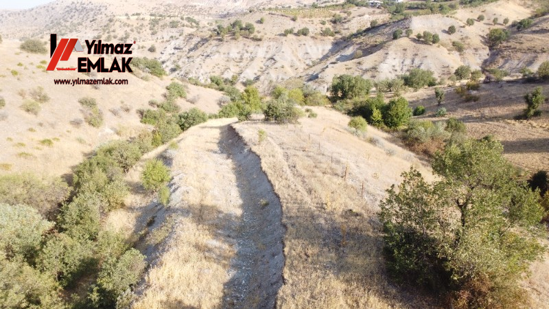 YILMAZ EMLAK'TAN TAŞLICA (ŞAMÜK) KÖYÜNDE SATILIK 54.378 m² KELEPİR TARLA