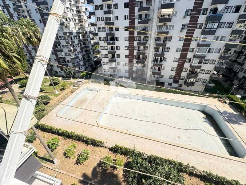 ALYANS'TAN MERKEZİ KONUMDA GMK'YA YAKIN MASRAFSIZ SİTE İÇİ 2+1