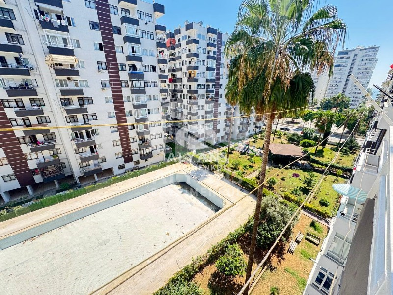 ALYANS'TAN MERKEZİ KONUMDA GMK'YA YAKIN MASRAFSIZ SİTE İÇİ 2+1