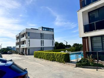 Kıbrıs Girne Lapta Bölgesinde Havuzlu Site İçinde Satılık 1+1 Zemin Kat Daire