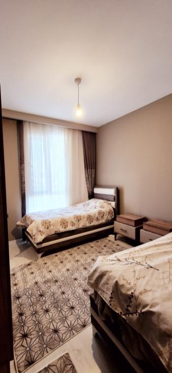 KUŞADASI Full Eşyalı ve Deniz, Şehir Manzaralı Satılık 2+1 Daire.....