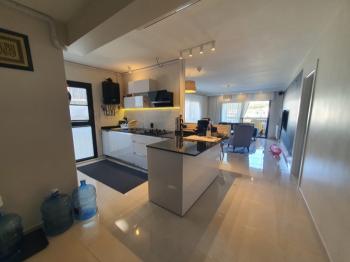 Kuşadası Kirazlı yolu üzeri geniş m2 3+1 Satılık Daire......