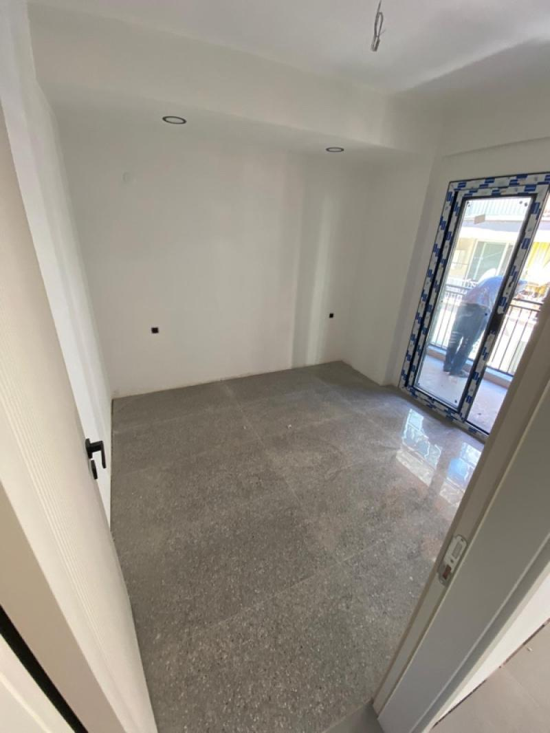 KUŞADASI Çarşı Merkezde 1+1 Sıfır Satılık Daire