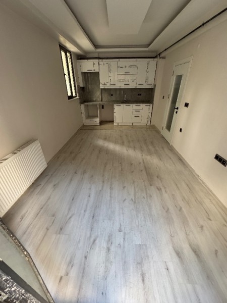 Karadolap'ta Otoparklı Sıfır Bina'da 1+1 Yatırımlık Satılık Daire