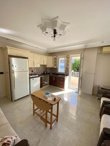 DİDİM ALTINKUM MAHALLESİNDE DENİZE YÜRÜME MESAFESİNDE 2+1 SATILIK FIRSAT DAİRE