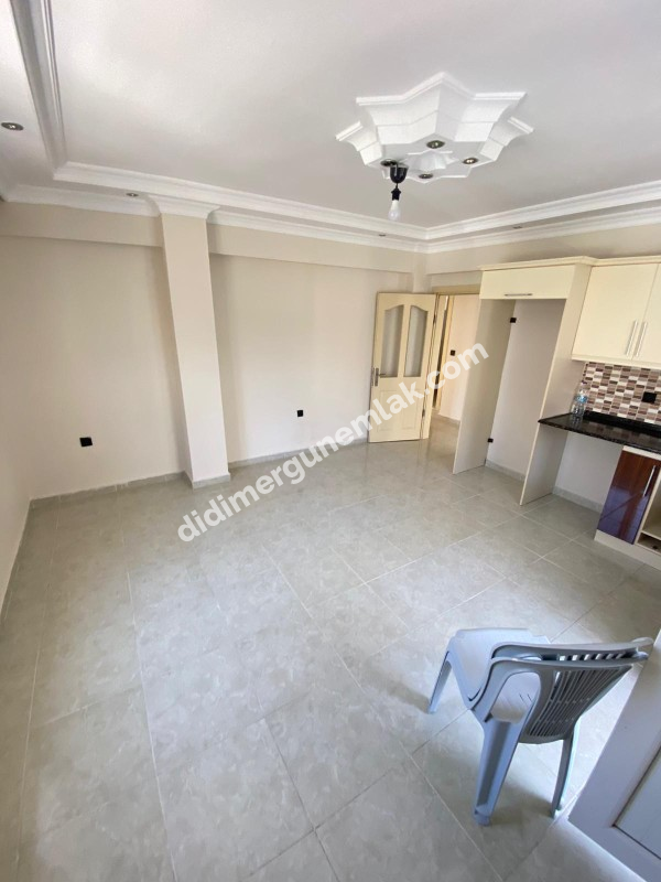 DİDİM ALTINKUM MAHALLESİNDE DENİZE YÜRÜME MESAFESİNDE 2+1 SATILIK FIRSAT DAİRE