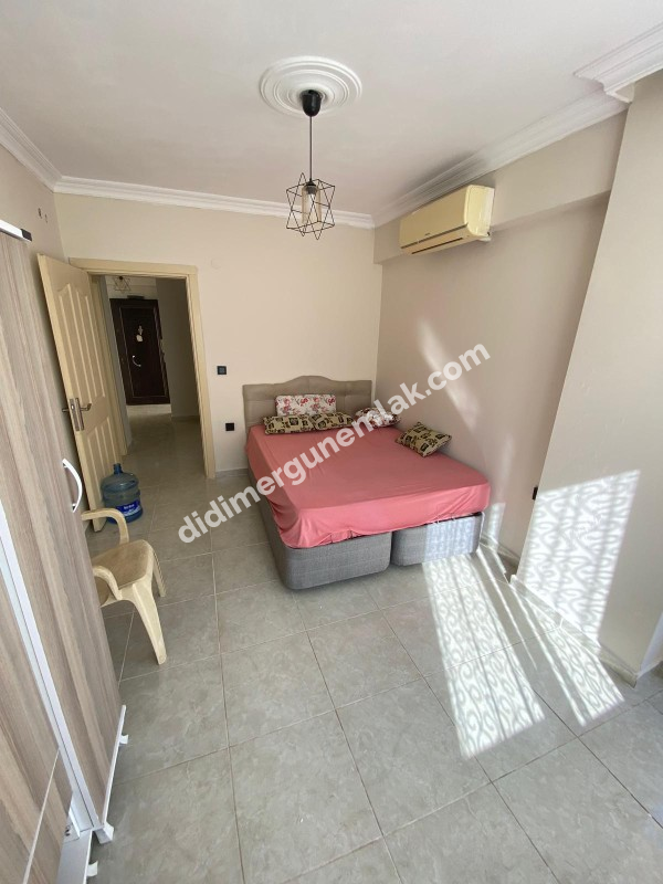 DİDİM ALTINKUM MAHALLESİNDE DENİZE YÜRÜME MESAFESİNDE 2+1 SATILIK FIRSAT DAİRE