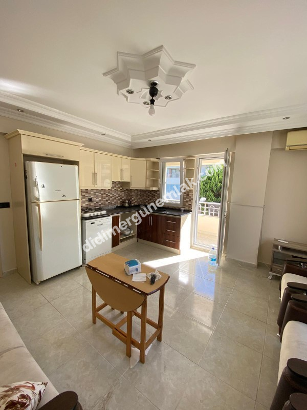 DİDİM ALTINKUM MAHALLESİNDE DENİZE YÜRÜME MESAFESİNDE 2+1 SATILIK FIRSAT DAİRE