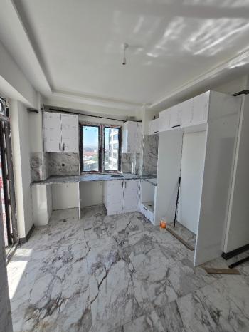 GÜVENAY - ÇORUM ÇEPNİ MAH.İNÖNÜ CADDESİ ÜZERİ SIFIR SATILIK 2+1 DAİRE