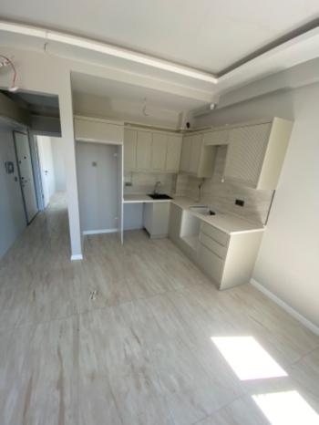 KUŞADASI Kadınlar Plajı Deniz Manzaralı Sıfır 1+1 Daire !!!