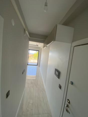 KUŞADASI Kadınlar Plajı Deniz Manzaralı Sıfır 1+1 Daire !!!