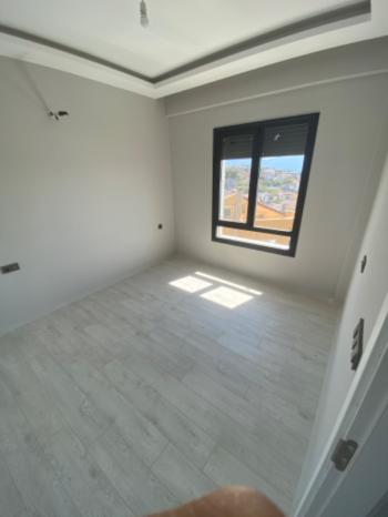 KUŞADASI Kadınlar Plajı Deniz Manzaralı Sıfır 1+1 Daire !!!