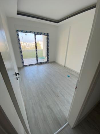 KUŞADASI Değirmendere'de Satılık Sıfır Deniz Manzaralı 2+1 Bahçe Katı!!!