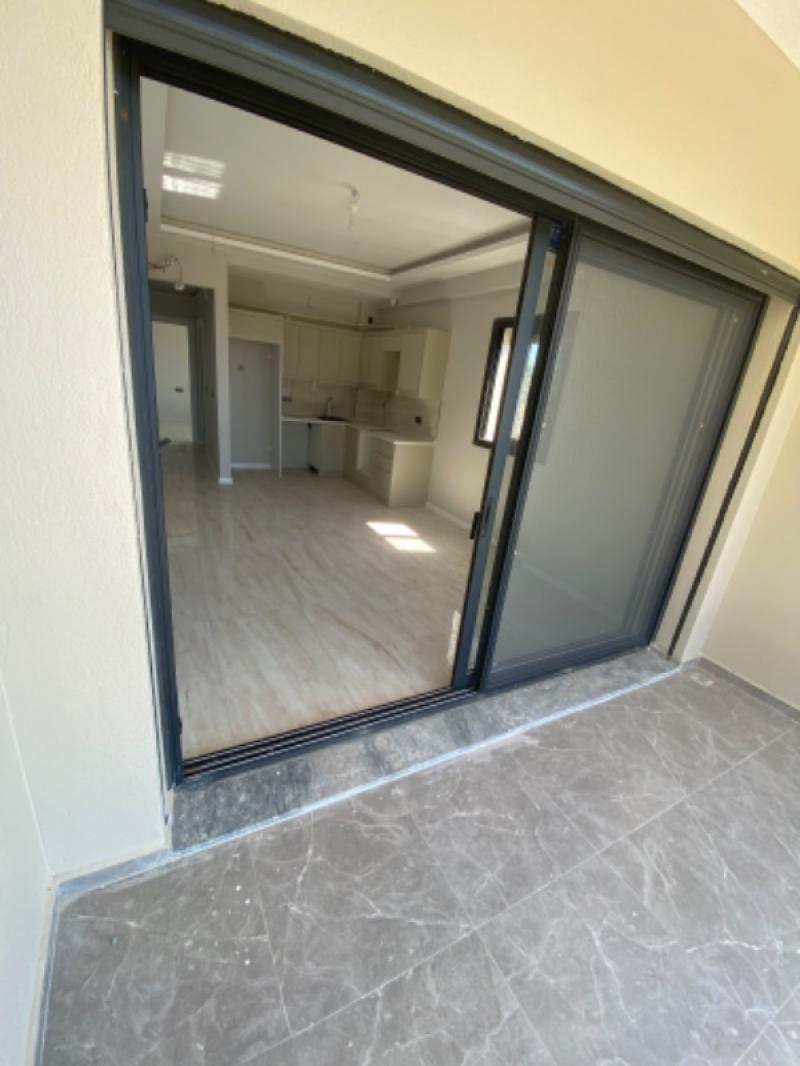 KUŞADASI Kadınlar Plajı Deniz Manzaralı Sıfır 1+1 Daire !!!