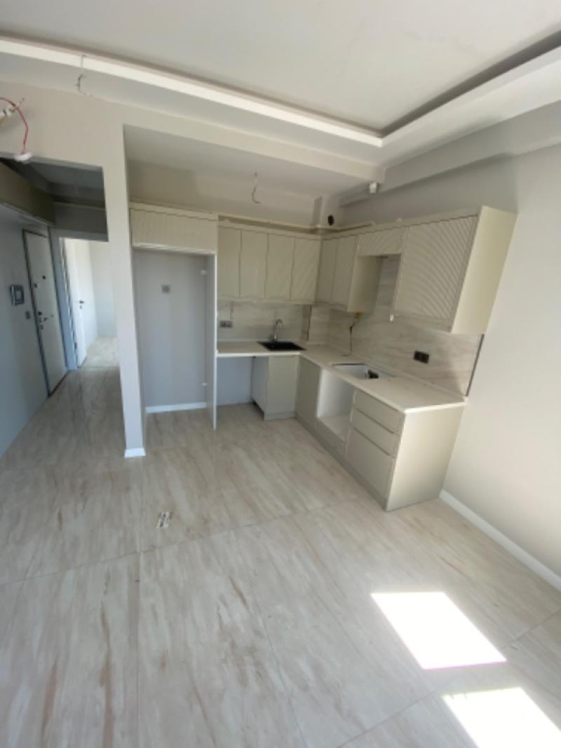 KUŞADASI Kadınlar Plajı Deniz Manzaralı Sıfır 1+1 Daire !!!