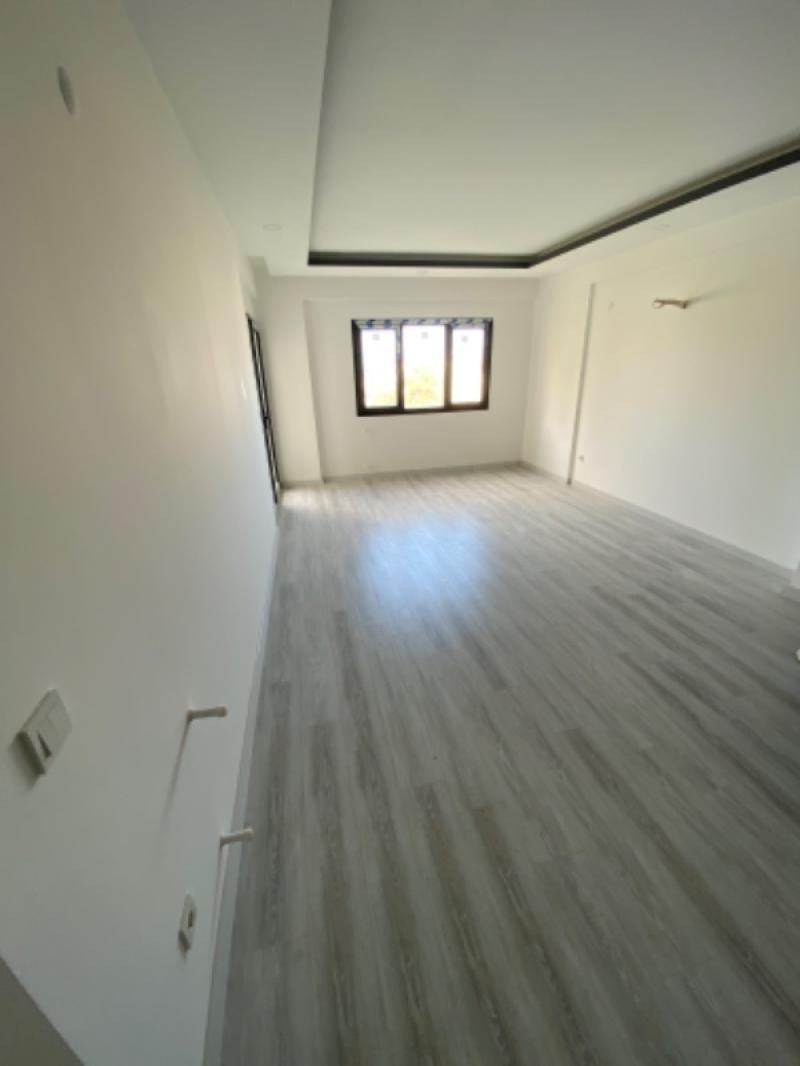 KUŞADASI Değirmendere'de Satılık Sıfır Deniz Manzaralı 2+1 Bahçe Katı!!!