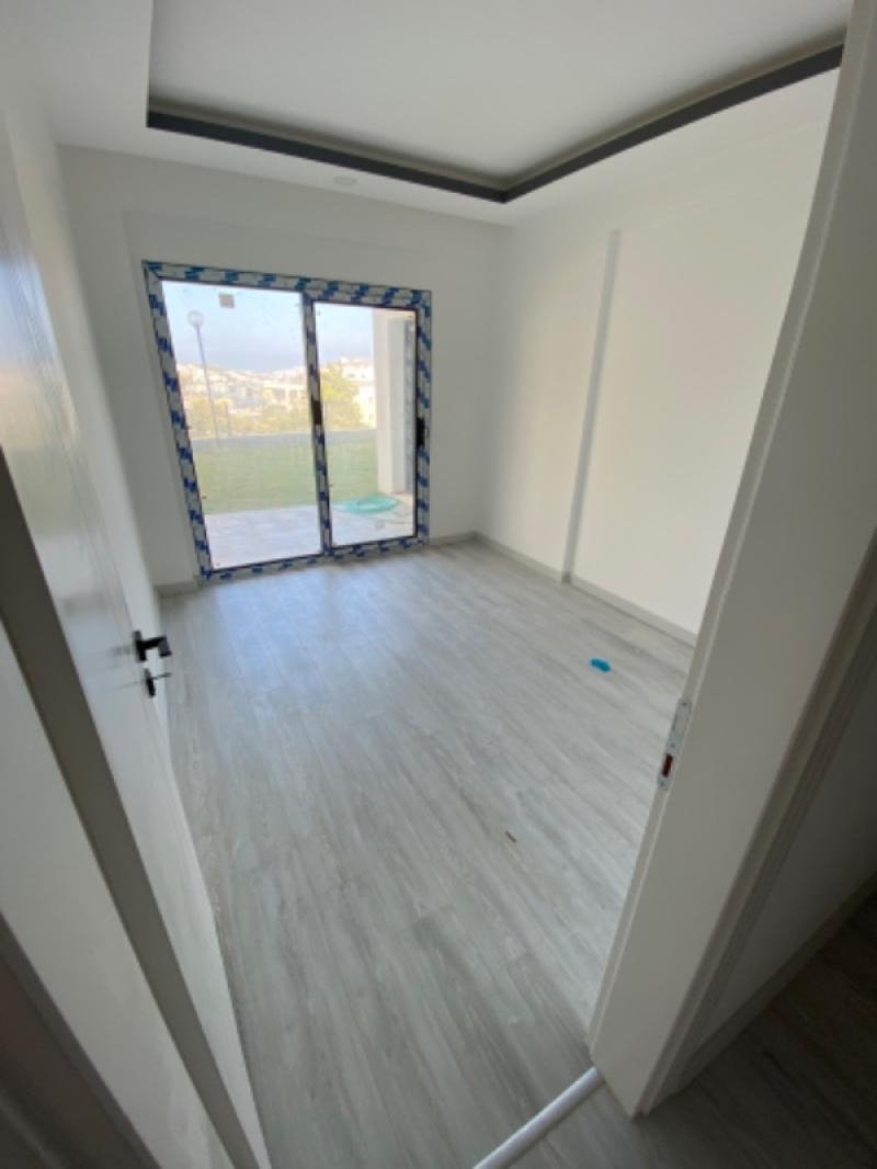 KUŞADASI Değirmendere'de Satılık Sıfır Deniz Manzaralı 2+1 Bahçe Katı!!!